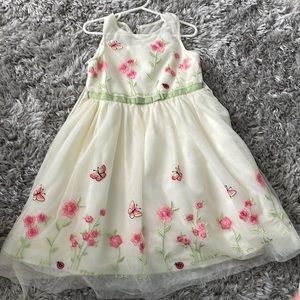 Pastel yellow butterfly and flowers girls size 5 dress. Great condition.